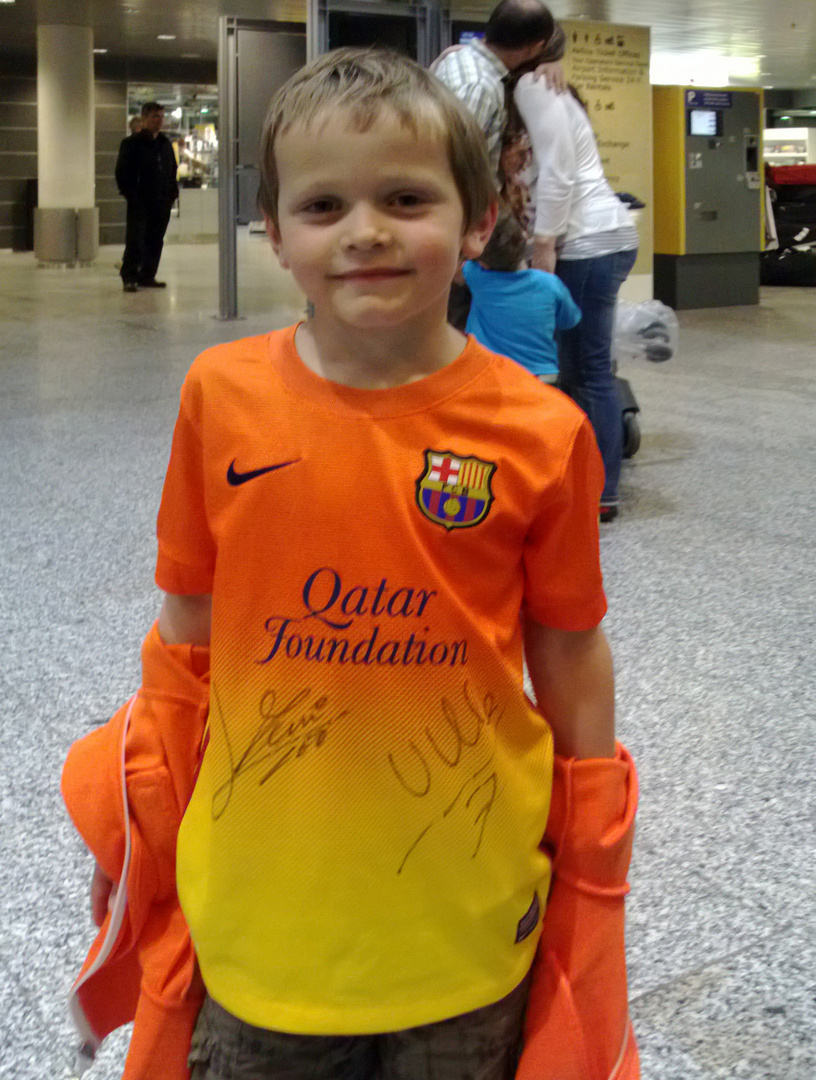 Very proud boy of the signiture Messi and Villa