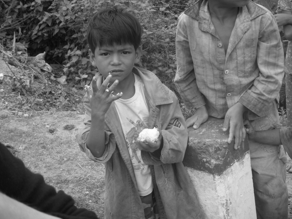 Vietnam : Un petit et sa boule de riz