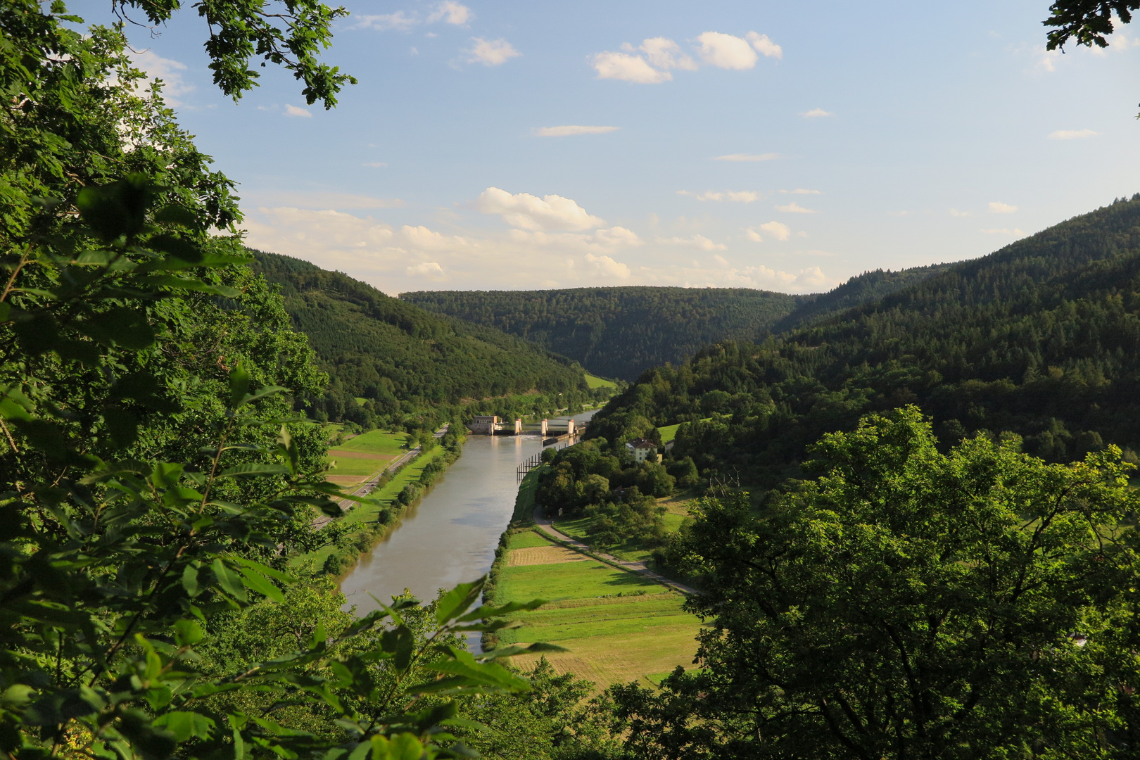 View down from Teufelskanzel of Kranichsberg hill to Neckar weir in the North of Baden-Württemberg