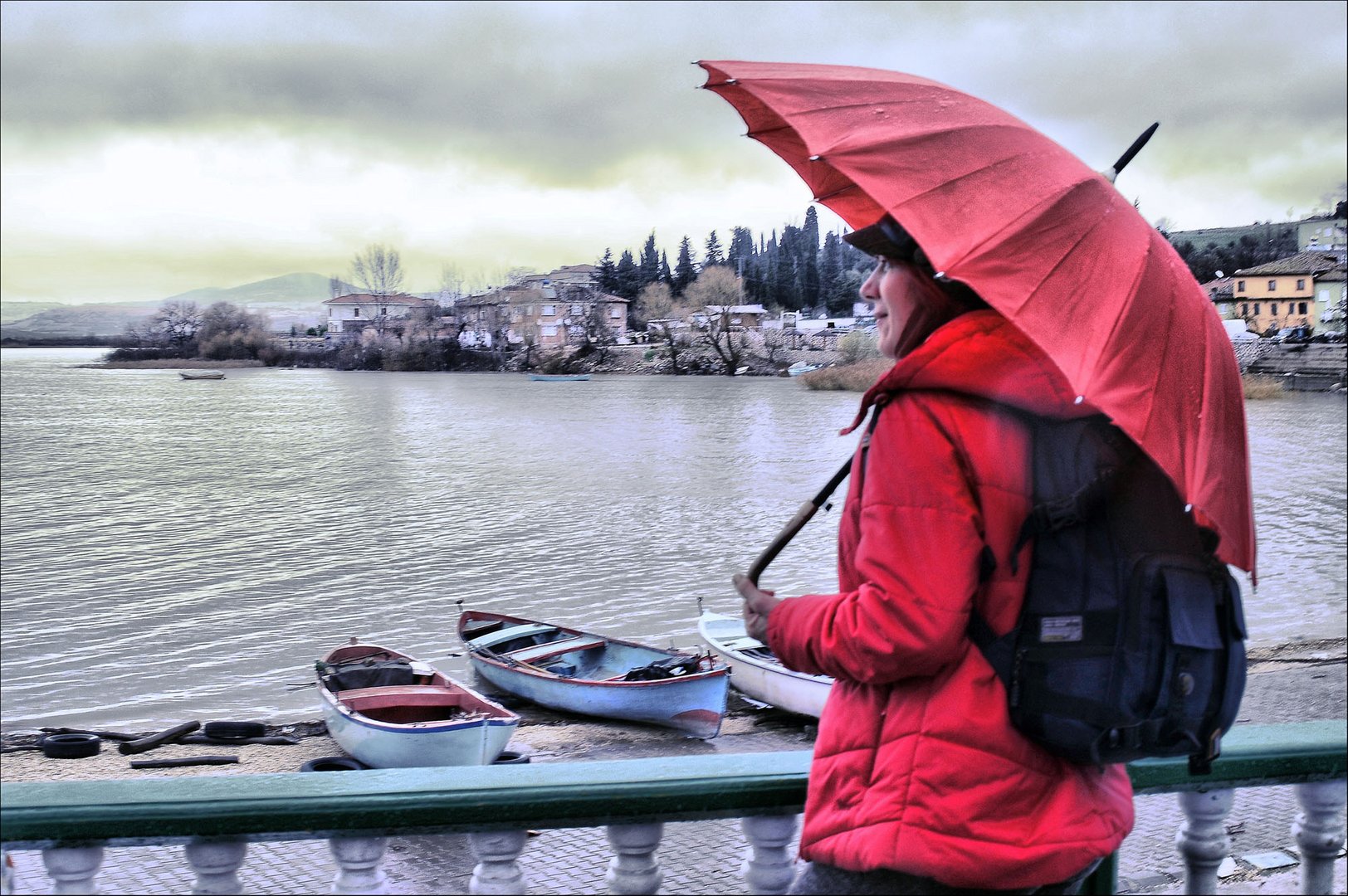 View to lake with red umbrella