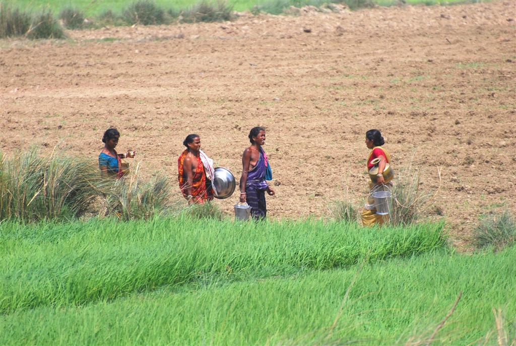 Village ladies to and fro riverside