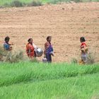 Village ladies to and fro riverside