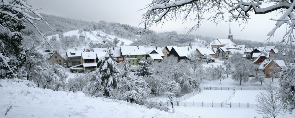 Village sous la neige de Mathieu 