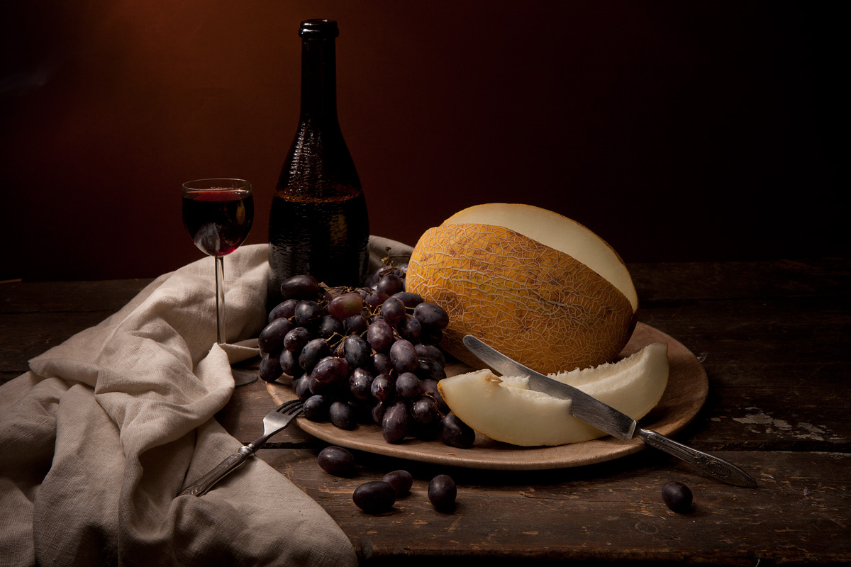 Vintage still life with melon and grapes