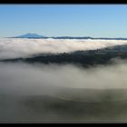 Volcanoes in a sea of clouds