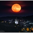 Vollmond über dem Grazer Uhrturm 