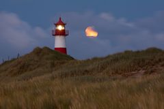 Vollmondaufgang am Leuchtturm