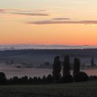 Von den Wolken wurde die Sonne in die Zange genommen...