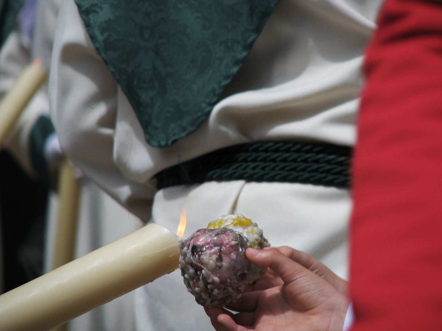 Wachsübergabe bei der Semana Santa in Málaga