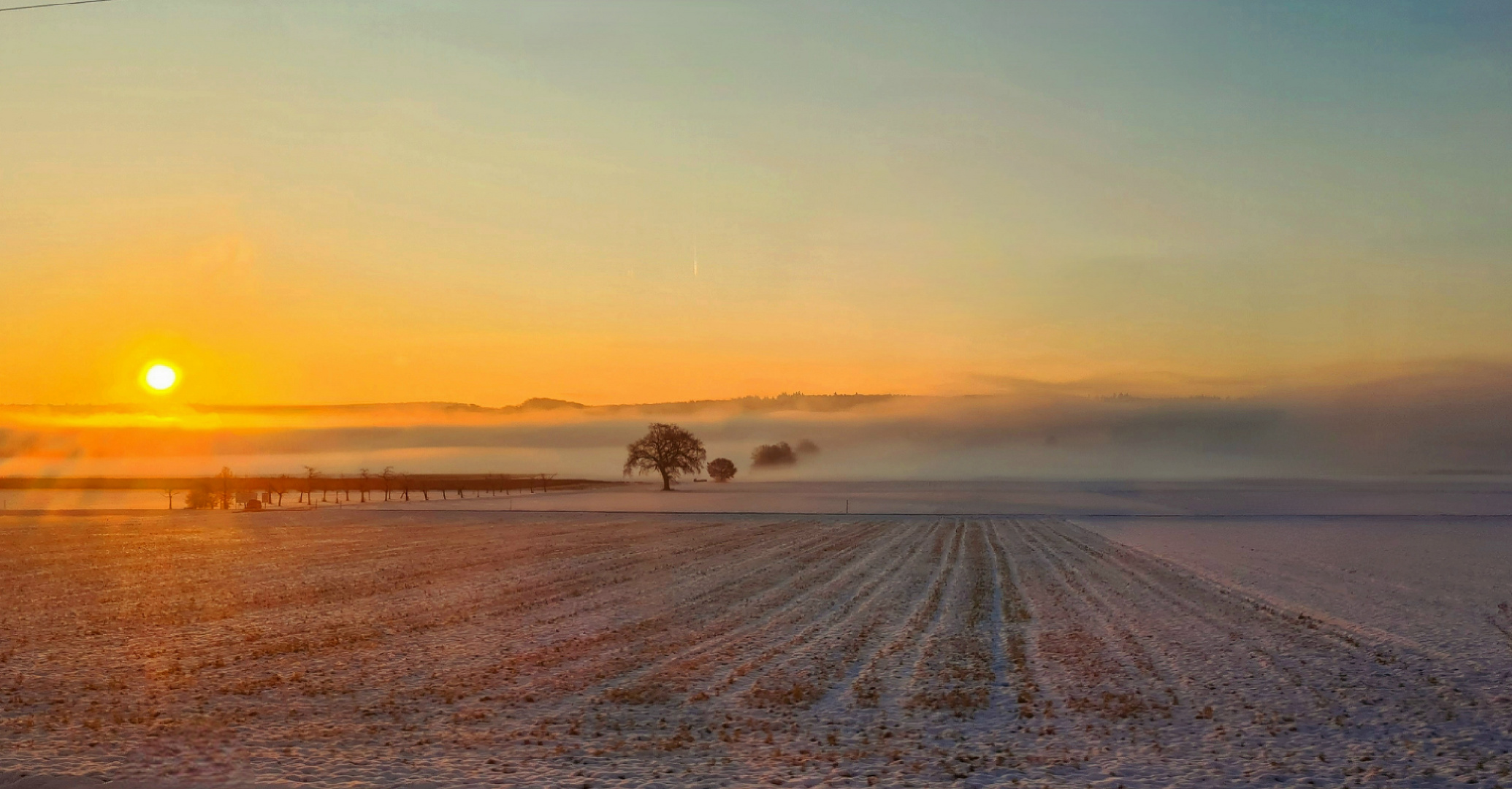 Wärmende Sonne an einem kalten Wintertag