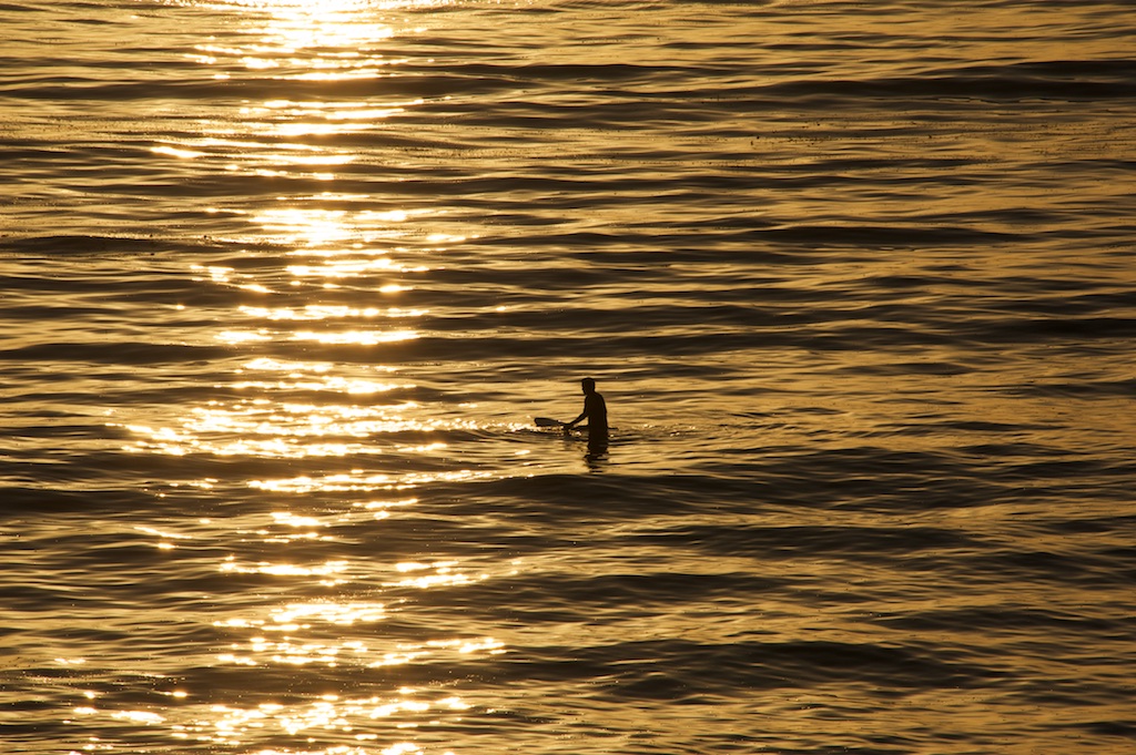 Waiting for the last wave of the day