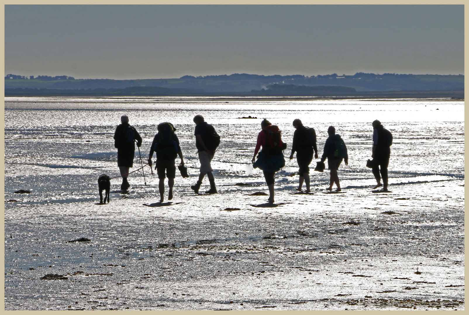 walkers on the pilgrims way Holy island 2