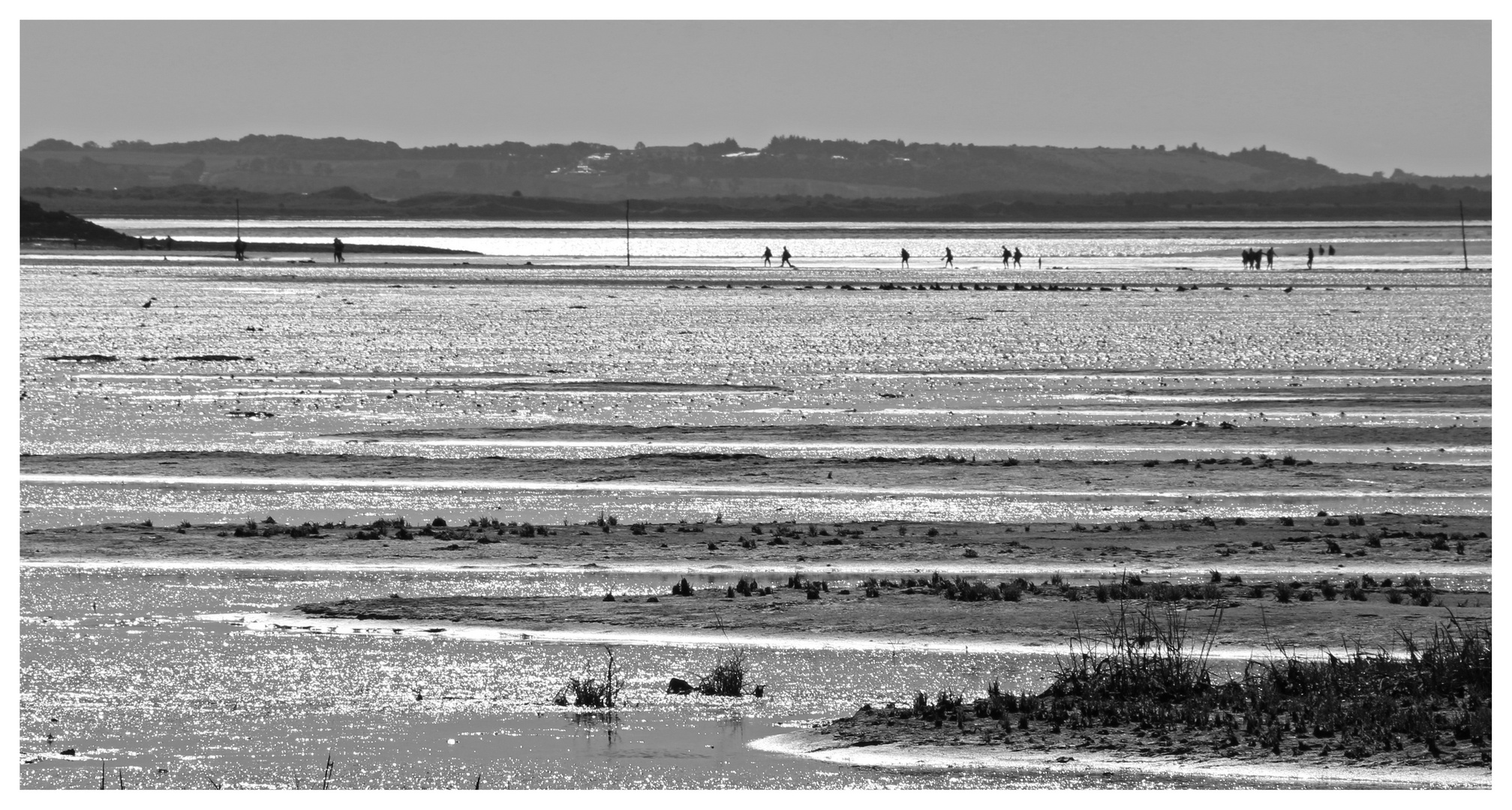 walkers on the pilgrims way Holy island 4
