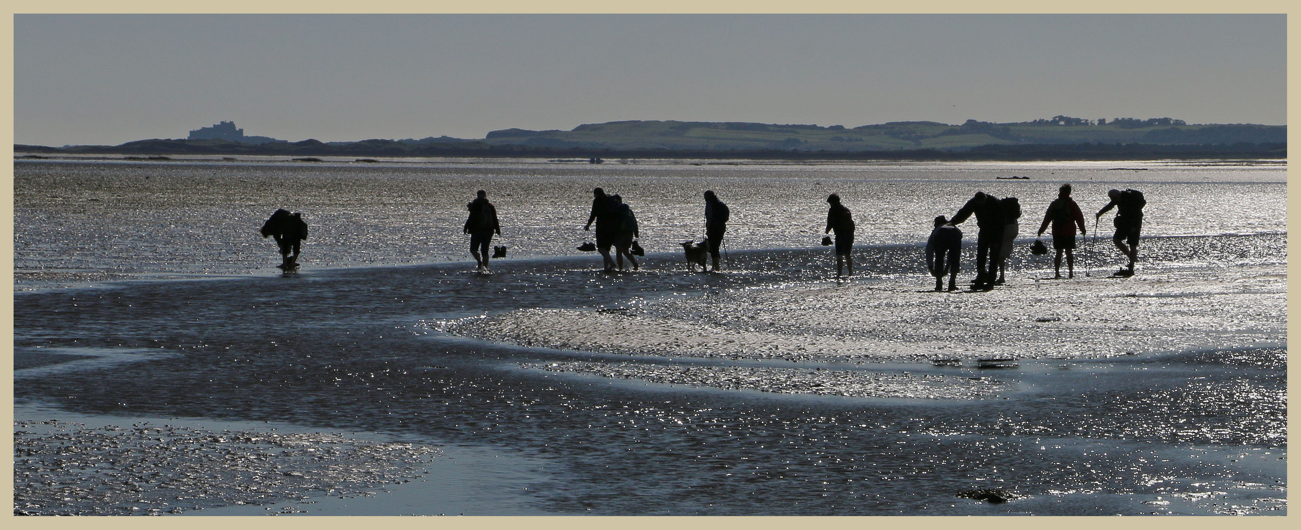 walkers on the pilgrims way Holy island 4