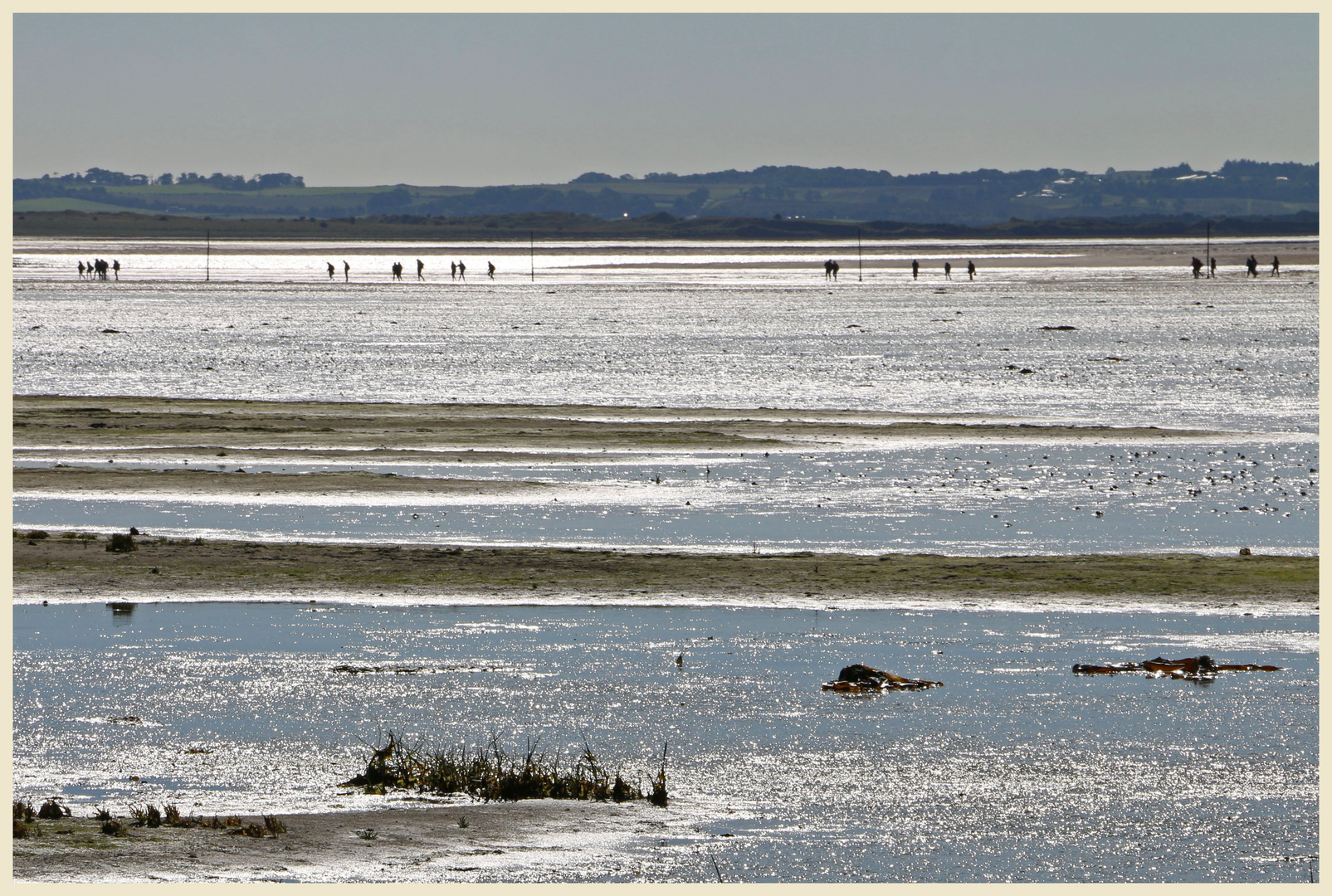 walkers on the pilgrims way Holy island 5