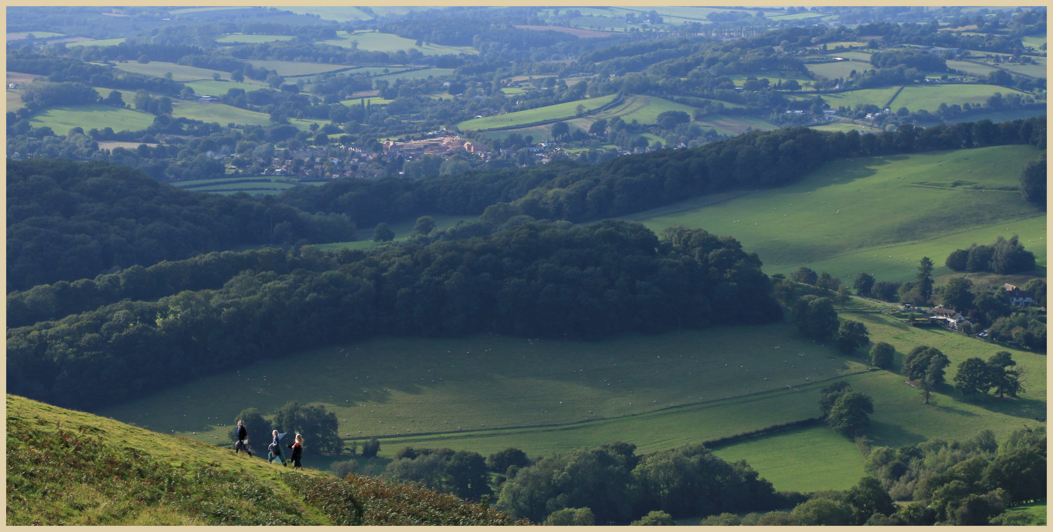 walkers on the side of the malvern hills