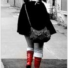 walking in red boots . .