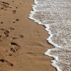 Walking next to the sea.