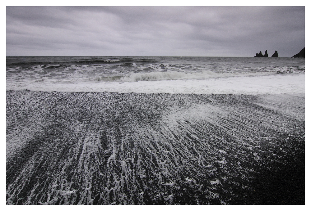 Walking on black sand...