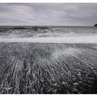 Walking on black sand...