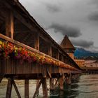 Walking through Switzerland. Luzern. Old Bridge. Kapellbrucke.