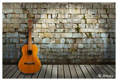 Wand und Gitarre