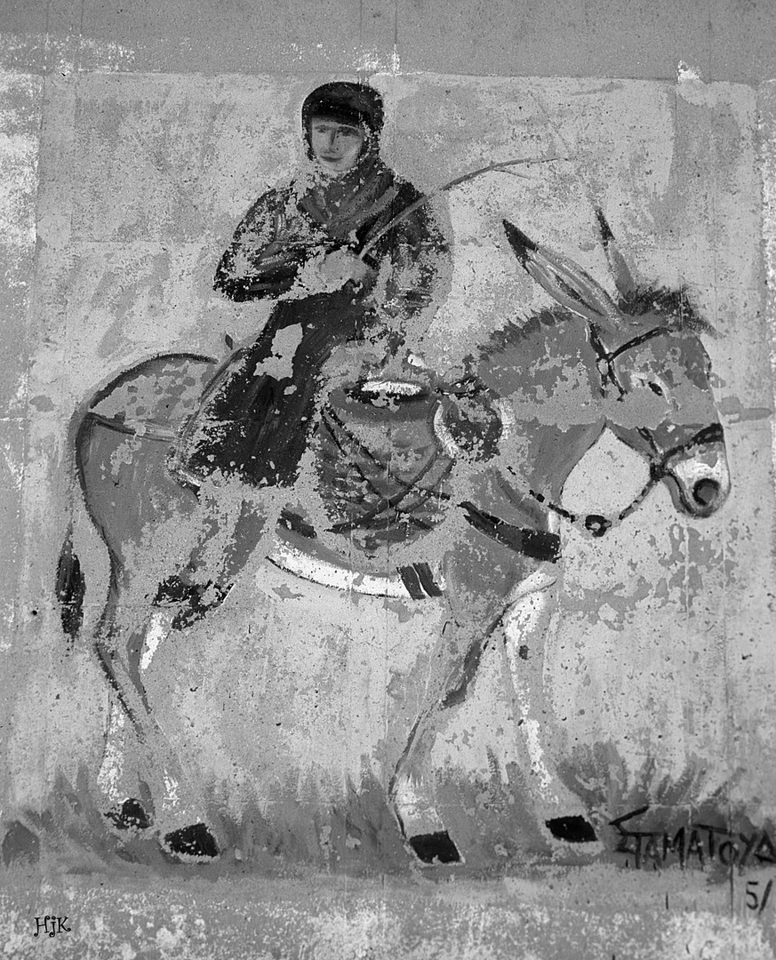 Wandbild Mann auf Esel