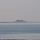 Warft on Hallig Hooge in the Mist