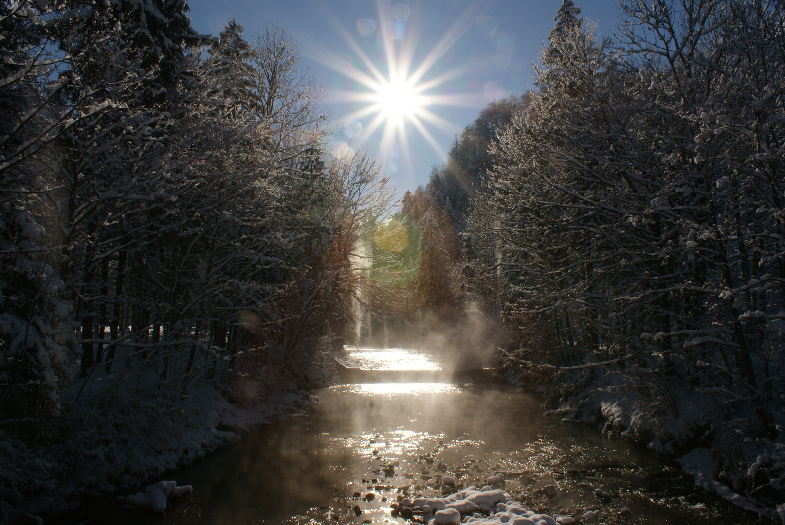 Wasser Sonne und Schnee