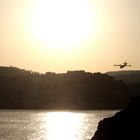 Wasserflugzeug im Sonnenuntergang