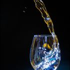 Wasserfontäne aus dem Glas