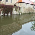 Wasserschloss im Wassergraben