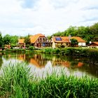 Wasserspiegel am historischen Fischrestaurant Bückemühle in Gernrode / Harz