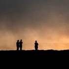 Watching reflection of sunset from cliffs