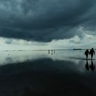 Wattwanderung mit Wolken oben und unten