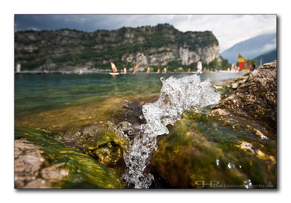 Wave surfing in Torbole