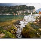 Wave surfing in Torbole