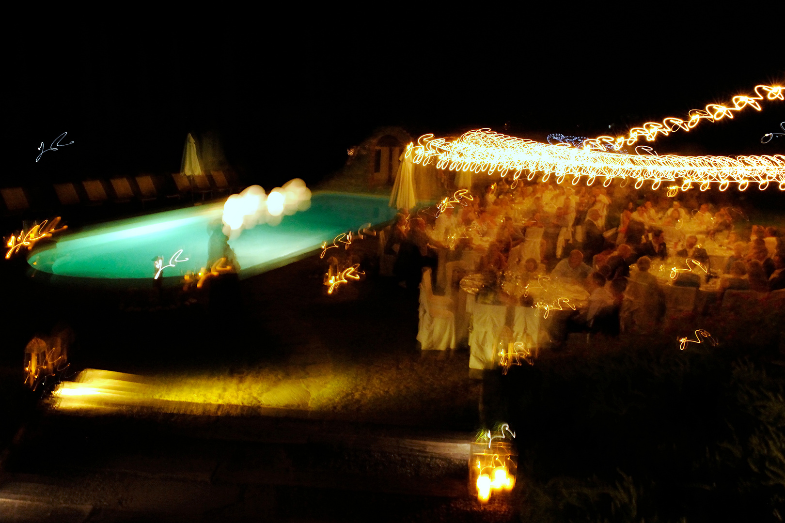 Wedding dinner around the pool.