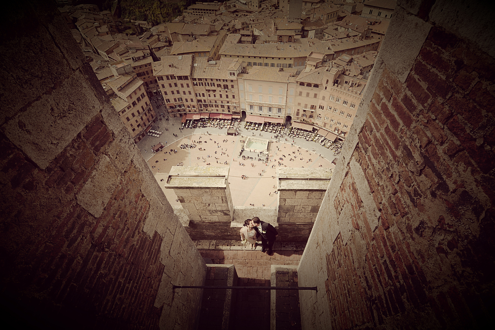 Wedding in Siena | Kiss on the top of tower.