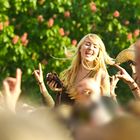 Weiblicher Fan auf einem Open Air Festival 2010