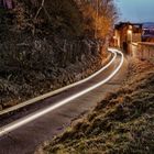 Weinbergstrasse beim Blasturm Schwandorf by Night mit Lichtspur eines Autos