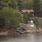 weiß grüner Leuchtturm Stockholmer Schären