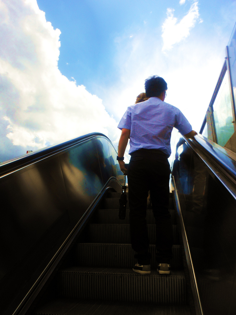 Weiterbewegung 1 auf der Rolltreppe