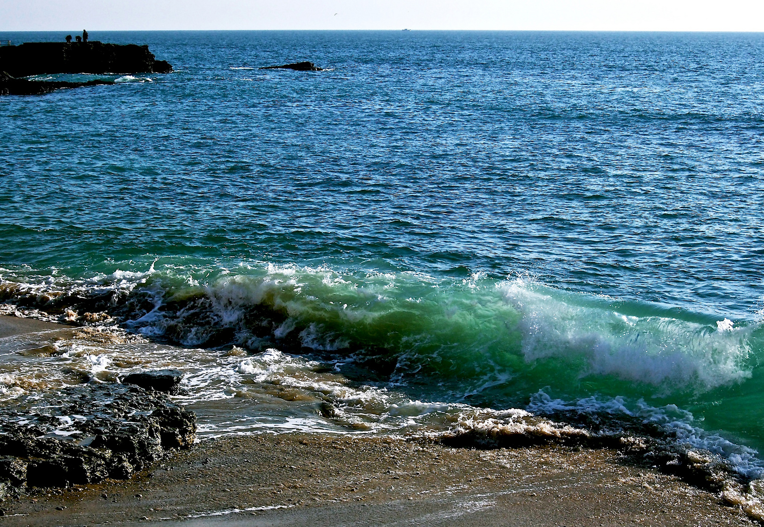 Welle am Strand von Estoril