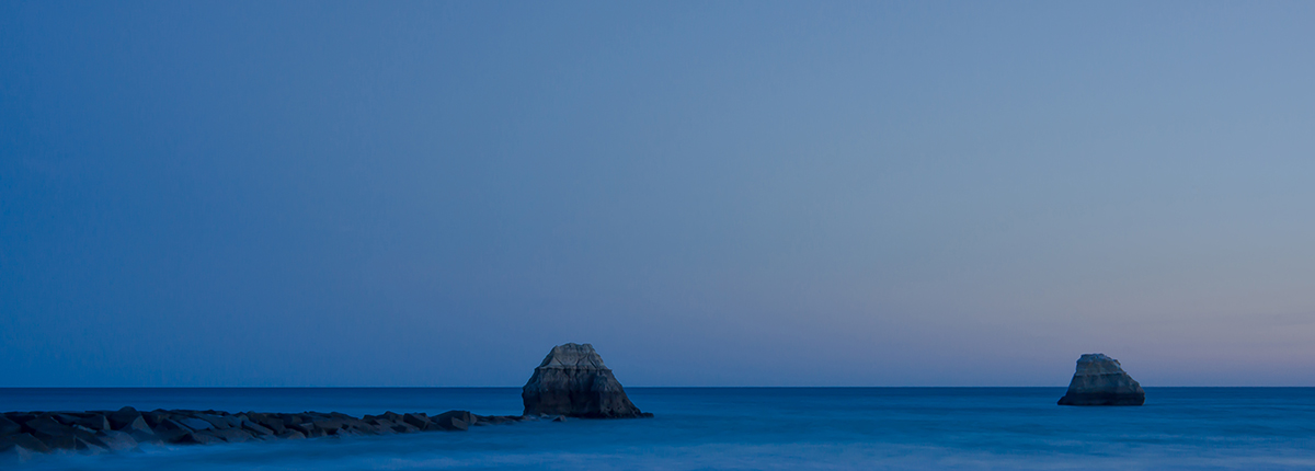 Wellenbrecher am Strand von Praia da Rocha