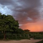 wenn die dunklen Wolken die Sonne in den Hintergrund drängen