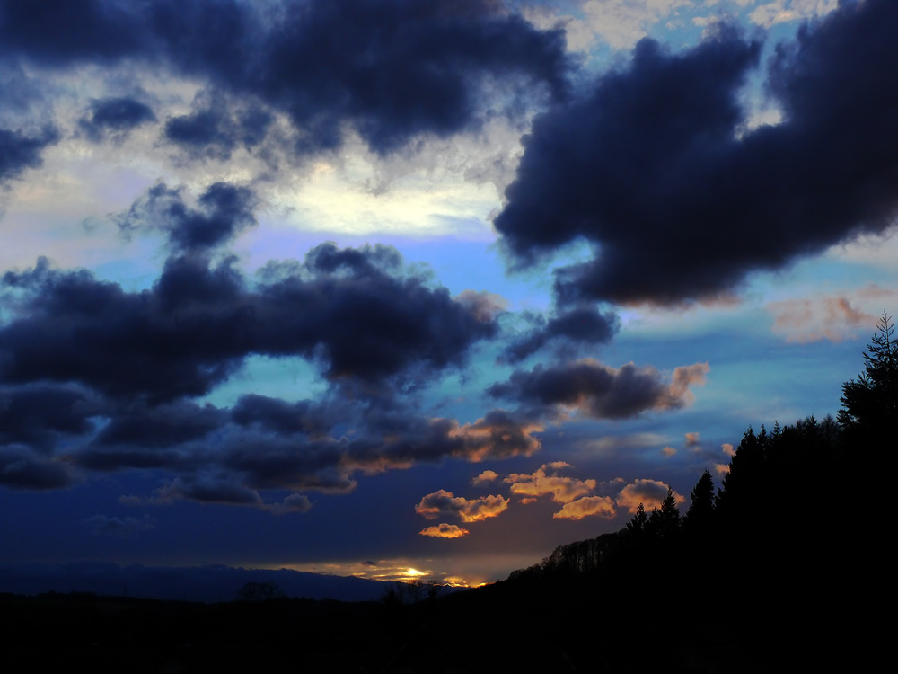 Wenn die Sonne die Wolken berührt