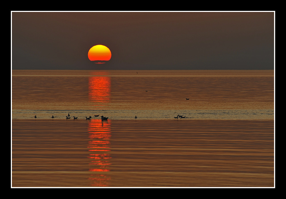 Wenn vor Ording die rote Sonne im Meer versinkt