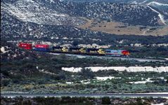 Westbound BNSF Double Stack Container Freight Train ....