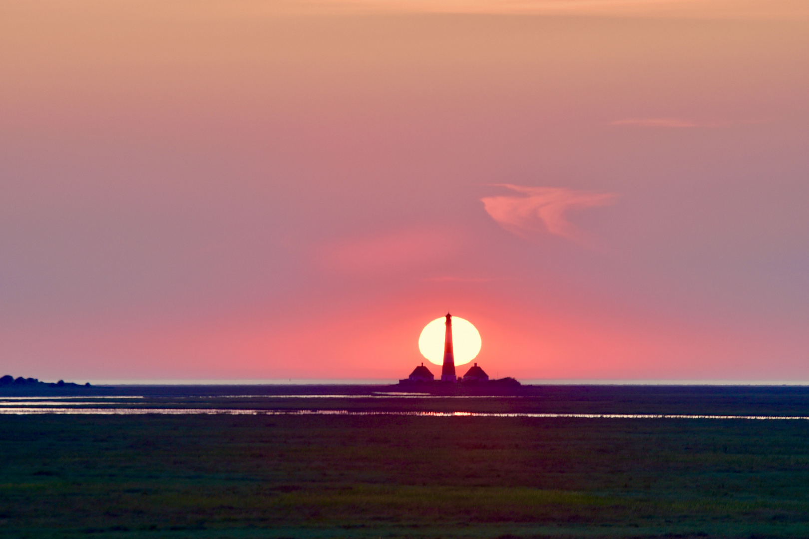 WesterheverSonnenuntergang hinterm Leuchtturm